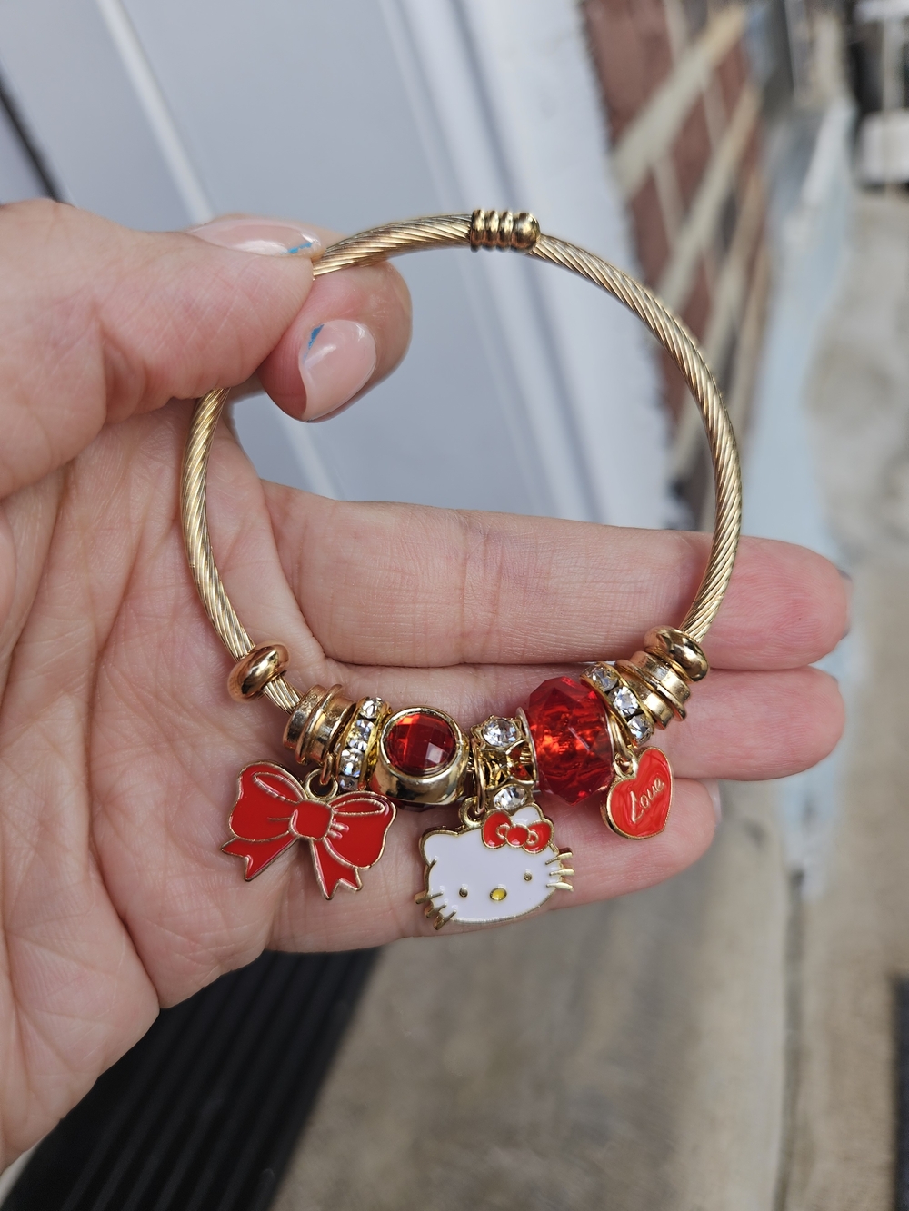 Red Charm Bracelet with Hello Kitty and Bow
